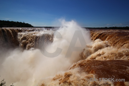 Water spray south america iguazu falls sky.