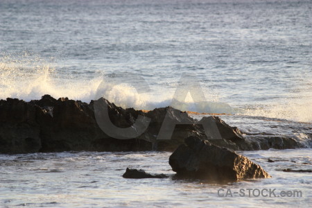 Wave rock surface sea water.