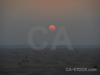 Western asia sky sand sun sunset.