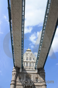 White bridge blue tower building.