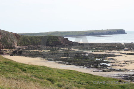 White rock green landscape cliff.