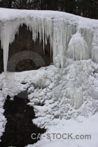 Winter gray snow icicle.